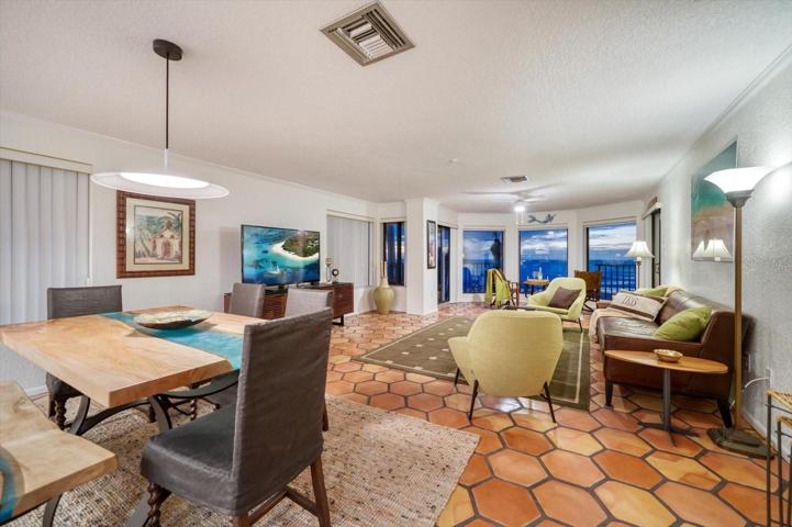 The open concept provides great space for entertaining by the sea!