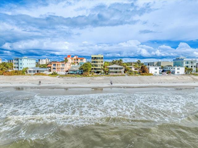 Your beachfront home- Steps to miles of sandy beaches, this is an oasis of relaxation in a private setting!