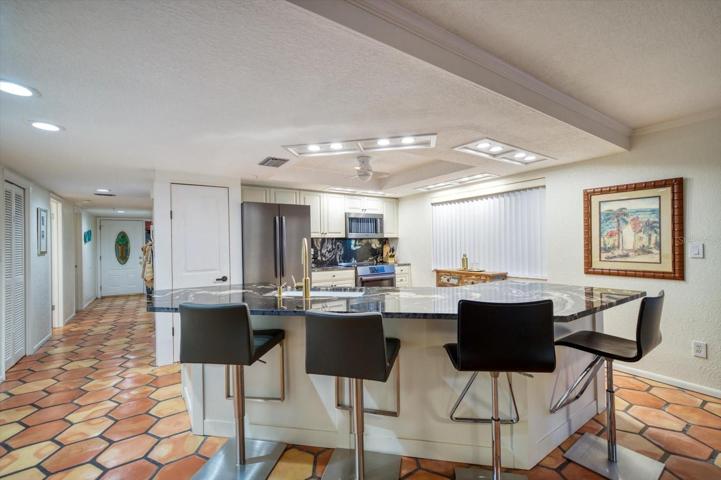 Entertain, cook up some fun  or relax in this tastefully updated fully furnished residence.