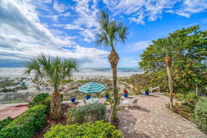 Large paved patio for gulf front entertaining.