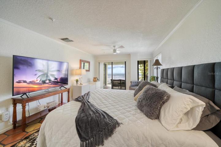 Inviting primary bedroom-wake up to the gently sounds of the Gulf waters...