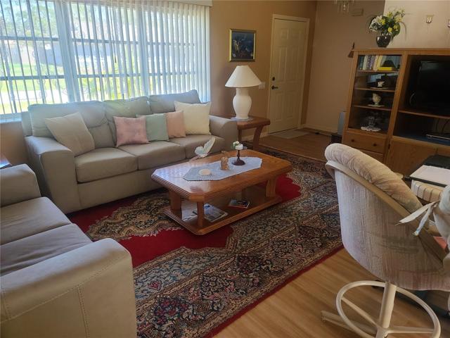 LIVING ROOM AND FRONT ENTRY
