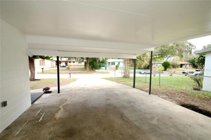 Car port for two vehicles.
