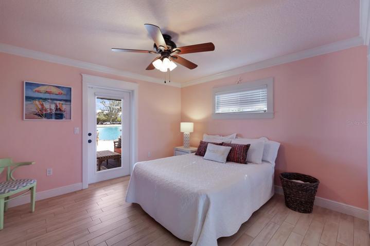 Guest Bedroom w/ Door leading to the Patio