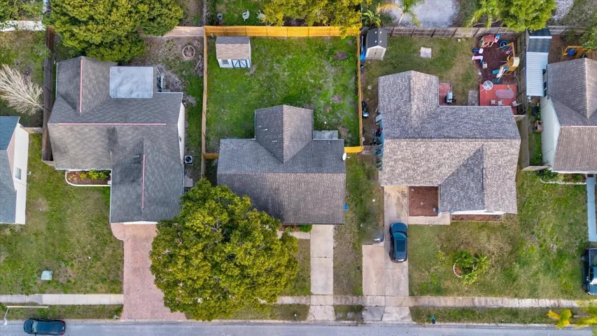 Drone shot looking straight down at the house and yard