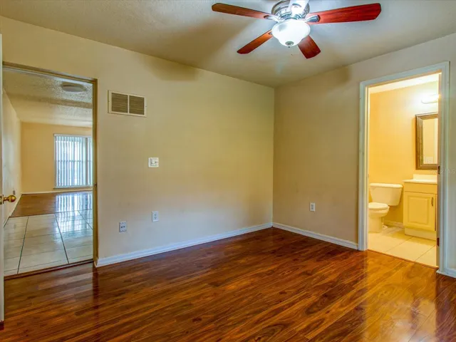 Primary Bedroom facing toward the kitchen