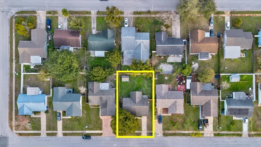Drone shot looking down over the neighborhood