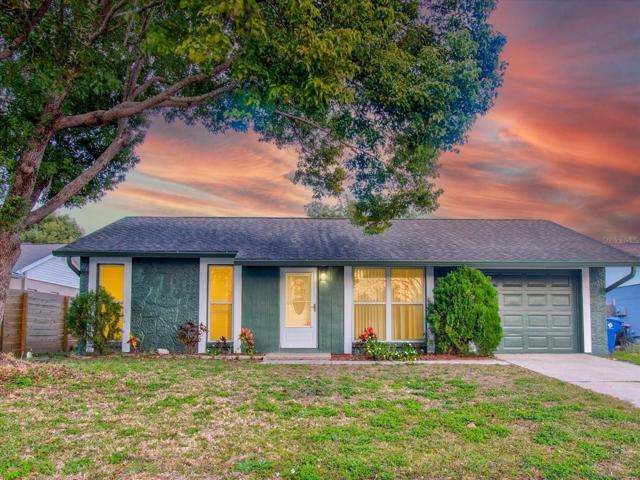 Twilight photo of front elevation of 3544 Murrow St
