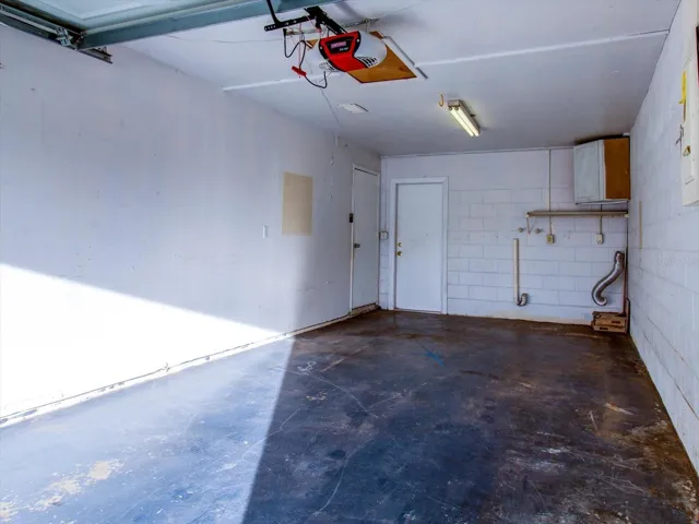 Garage facing toward kitchen entrance and exit o backyard