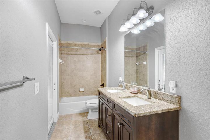 VIEW: POOL BATH ... ALSO THE SHARED BATHROOM OF BEDROOMS 1 & 2