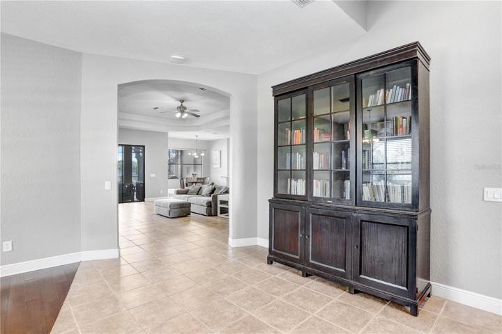 VIEW TOWARDS GREAT ROOM,DINETTE, LANAI & POOL, DINETTE & KITCHEN FROM IN FRONT IF THE OFFICE