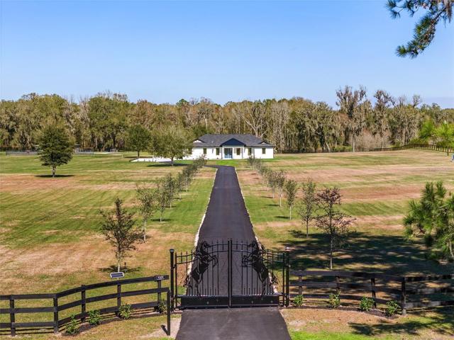 Welcome home to this 2023 custom home on 21.6 acres.