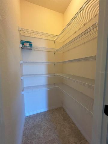 Large walk in pantry located in the FLEX SPACE