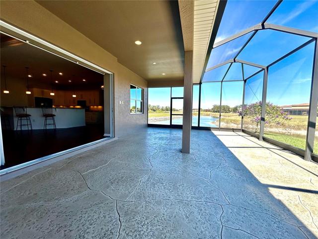 Pocket doors completely disappear offering a grand opening into the veranda