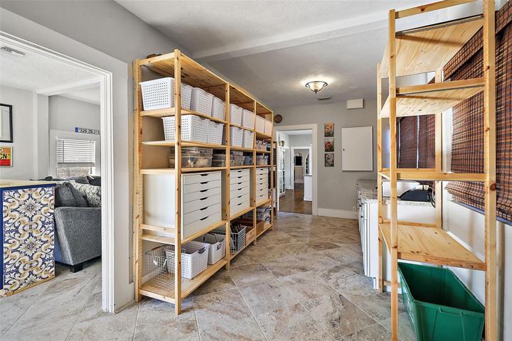 Open shelving in the Utility room conveys!