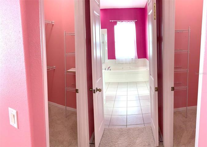 MASTER BEDROOM HIS AND HER CLOSETS