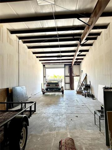 VIEW OF INTERIOR FROM BACK OF UNIT