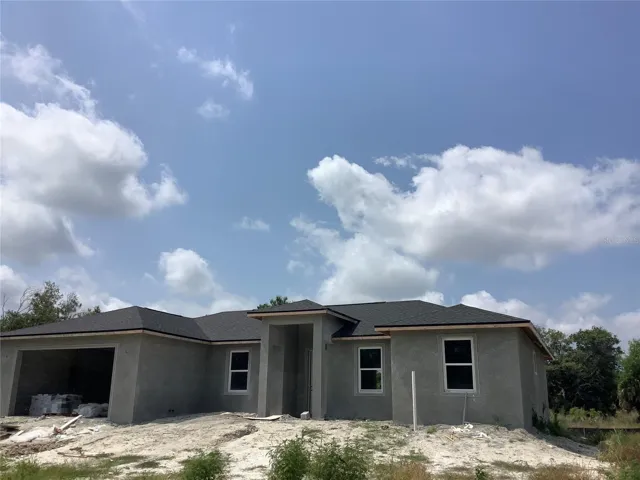Front elevation 1674 model on another homesite