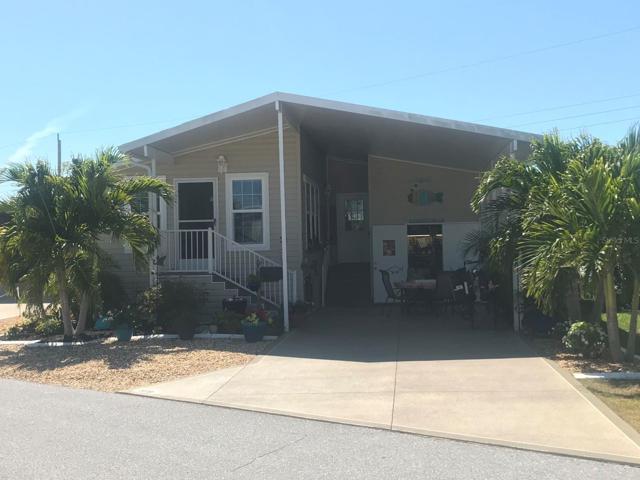 WELCOME TO 609 LEISURE  WITH MATURE LANDSCAPING PROVIDING PRIVACY AND BEAUTY