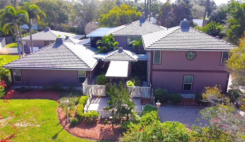 Welcome home to this stunning 4 bedroom, 3 1/2 bathroom home plus there is a separate Detached 2 bedroom, 1 bathroom Guest/In-Law Home.