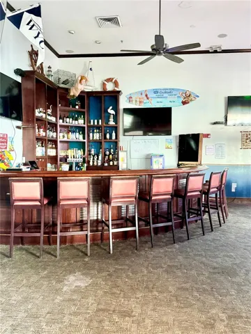 Yacht Club full liquor Bar with wide water views.