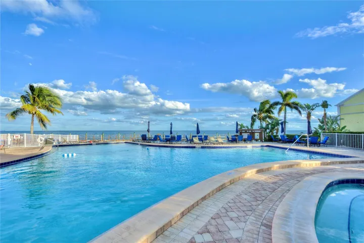 Waterfront pool and spa / hot tub.