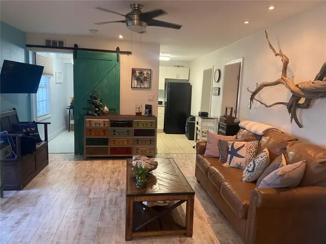 Barn door to 2nd bed room / office from Living Area