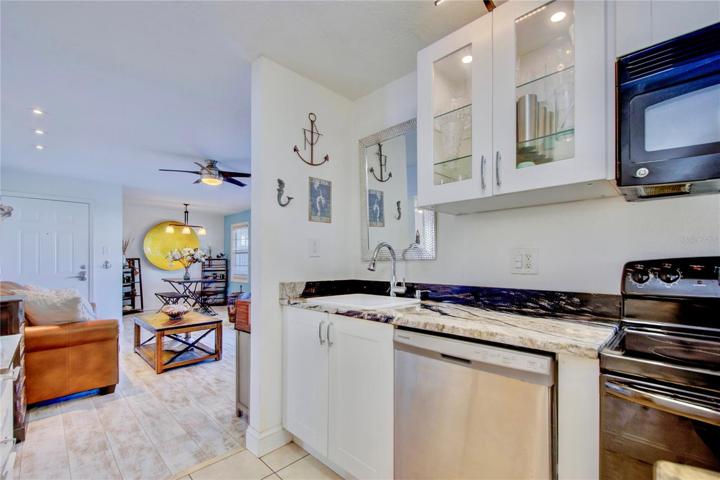 Renovated kitchen opens to living area for seamless entertaining.