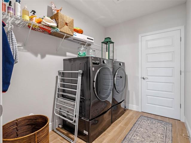 Front Load Washer and Dryer on Drawer Pedestals are INCLUDED!  Pre-Plumbed for a Laundry Sink