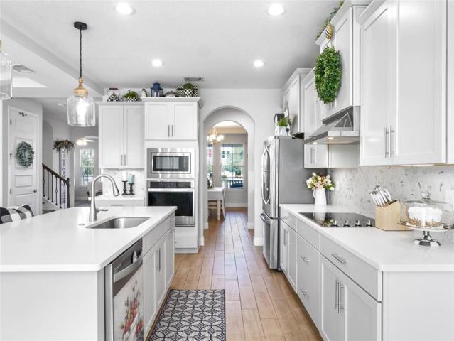 SS APPLIANCES includes Built in CONVECTION OVEN, LG French Door Refrigerator with Custom Ice Spheres.