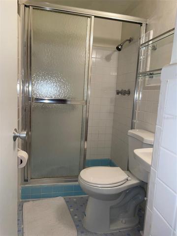 Ensuite bath with walk in shower.