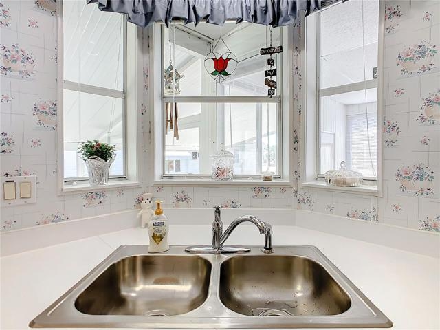 Double sink in the kitchen and nice views out of the window