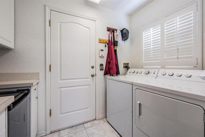 Walk-in laundry room with extra storage options