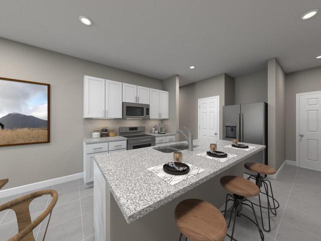 Photo is not of the actual home, but is an inspirational photo of builder’s model home and may depict options,