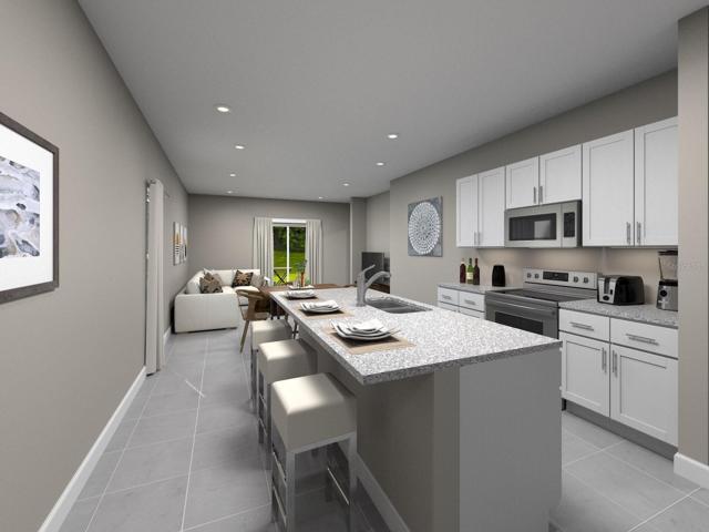 Photo is not of the actual home, but is an inspirational photo of builder’s model home and may depict options,