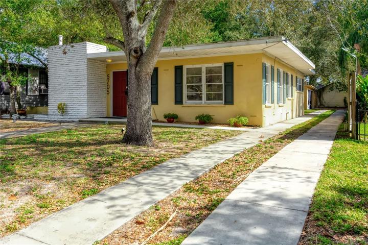 Driveway extends the length of the property