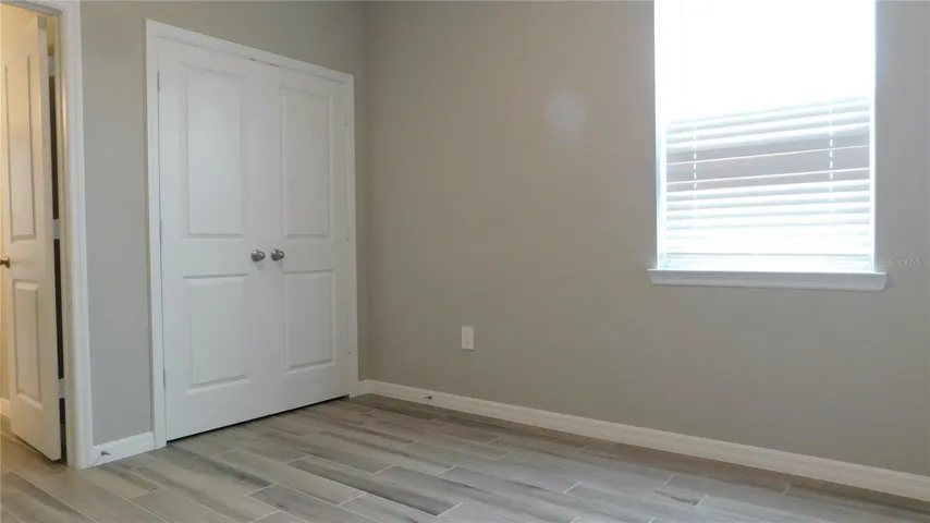Third bedroom shares a Jack and Jill bathroom and features large closet