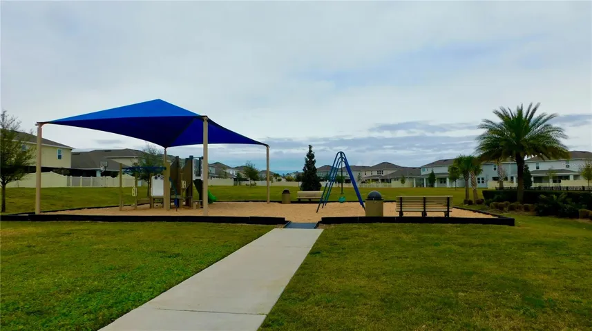 The community features a playground, wide open play area and walking trails