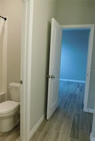 The Jack and Jill bath features private toilet and shower area