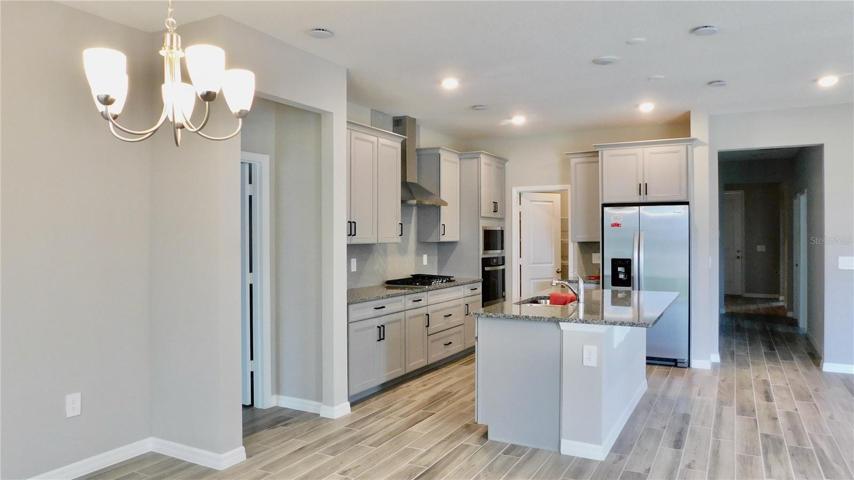 The kitchen features a WALK IN PANTRY!