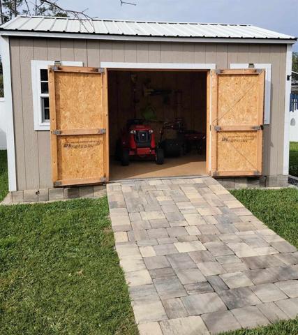 all yard equipment can stay. Including pressure washer.