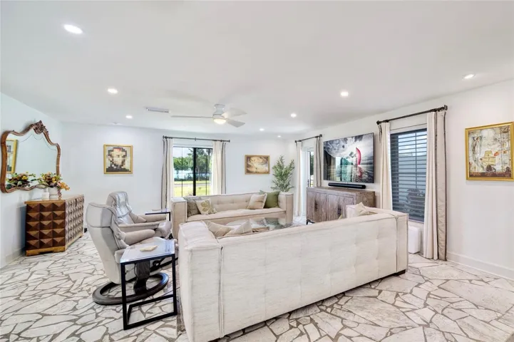 Living Room with door to outdoor front patio