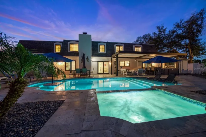 Large lot offers renovated home with pool & spa