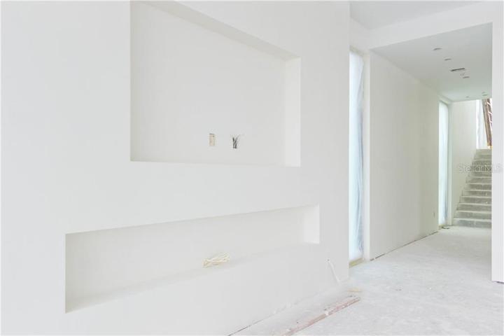 living room built-ins and 2nd floor stairs- January progress
