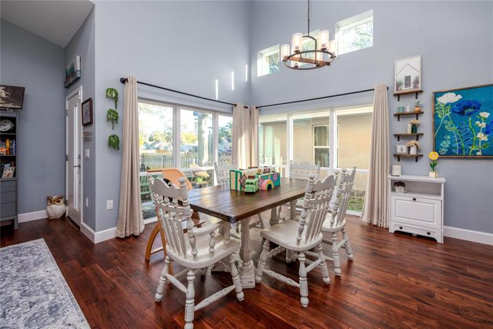 Open Concept Living Spaces - Dining Room and View of Back Patio