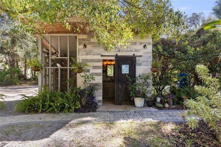 outdoor bathroom with shower and dove coup