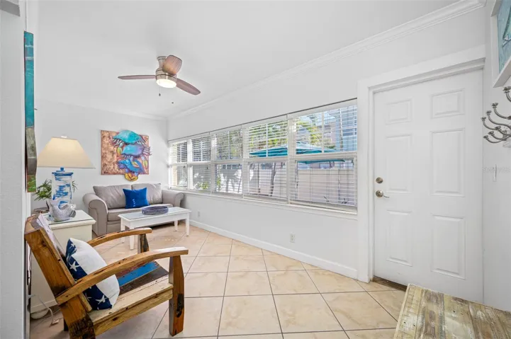 Sunroom with Sleeper Sofa and Backdoor to Private Fully Fenced Backyard