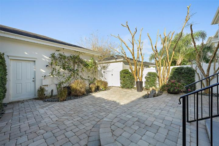 Patio with entry into 2 car garage