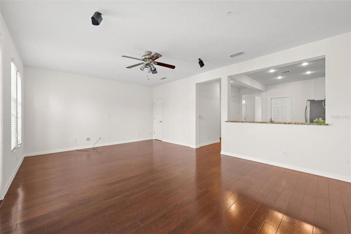 Family Room with serving bar into kitchen