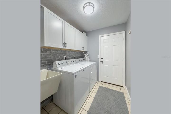 33. Laundry Room leading to the Garage